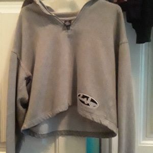 a cropped hoodie with a zipper